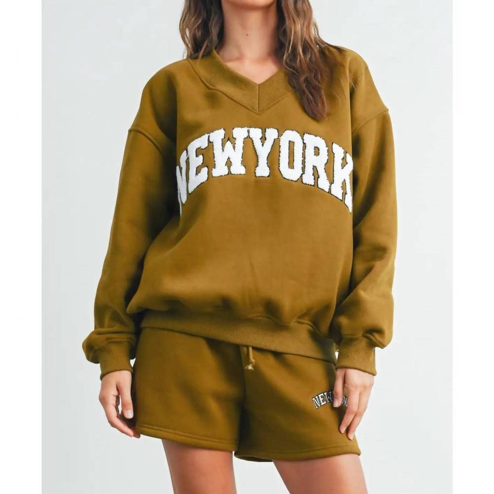 NEW BUTTERMELON new york v-neck sweatshirt in olive